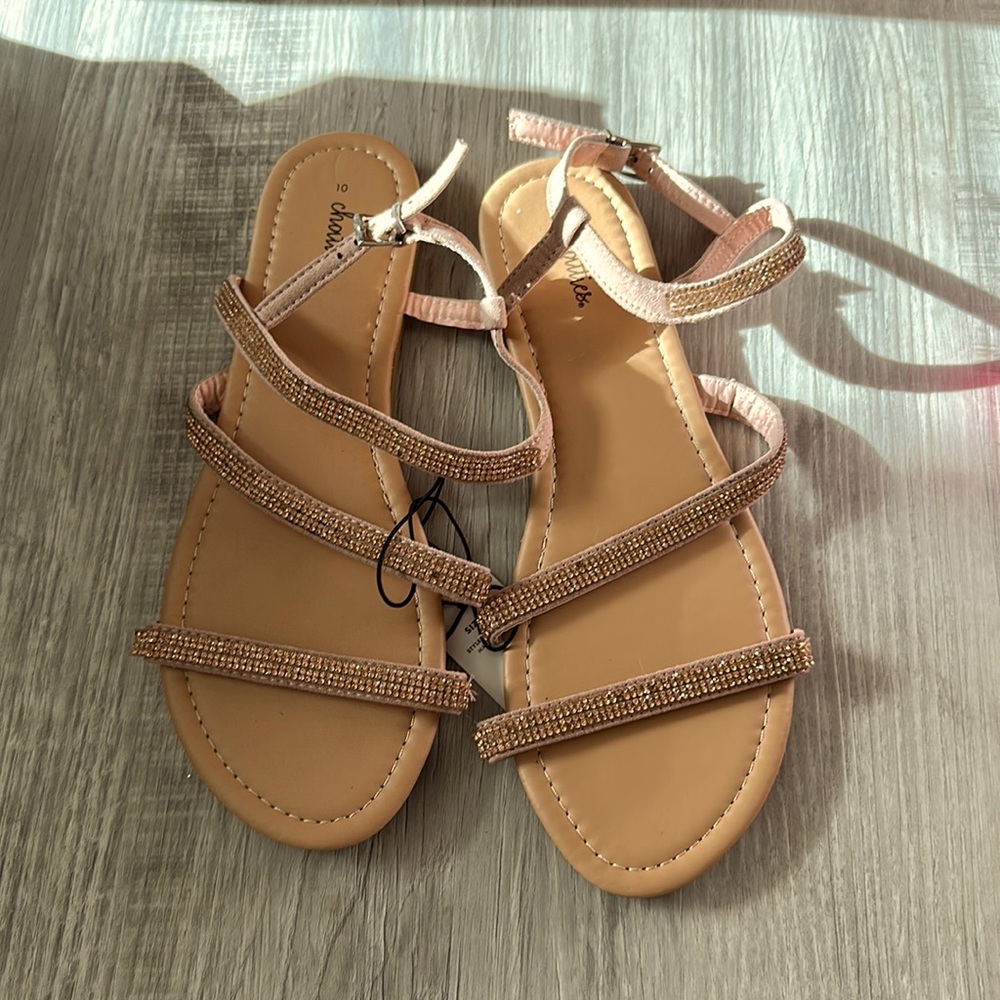 Blush and tan colored sandals with rhinestones